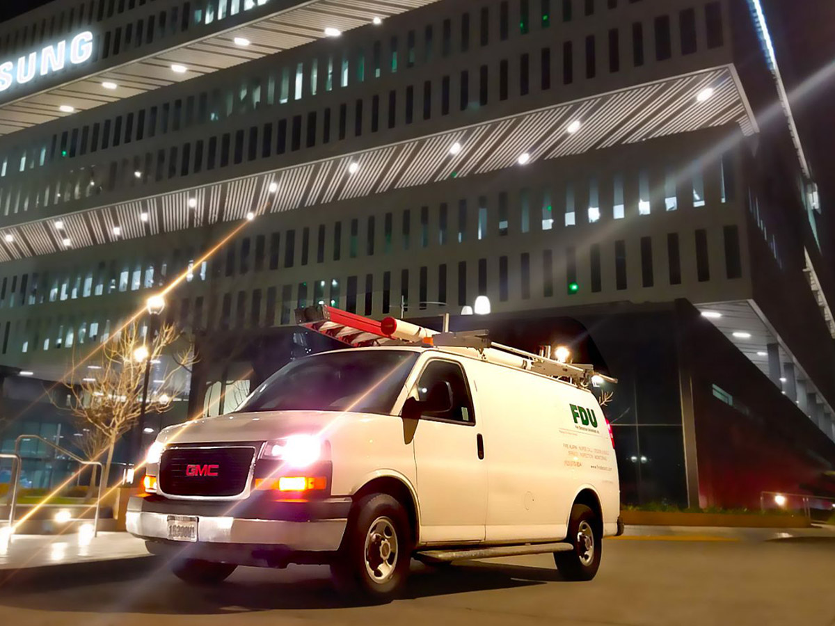A large commercial building with fire alarm installations.